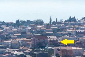 Nespecifikovaný výhled na destinaci Kaštela nebo výhled na město při pohledu z penzionu