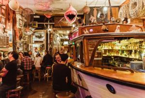 a group of people sitting at a bar at Private sanctuary between river and sea in Perth