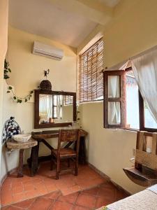 a dining room with a table and a window at Hotel Artesanal Palomera in San Francisco +15 photos