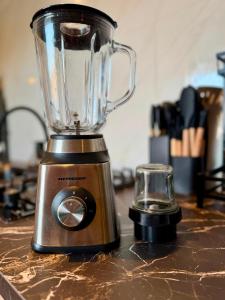 a blender sitting on top of a counter at The Almas Container in Willemstad