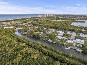 an aerial view of a resort on the water at Hutchinson River House in Fort Pierce