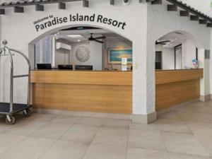 a luggage cart in front of aaza island resortasteryasteryasteryasteryasteryastery at Paradise Island Resort in Gold Coast