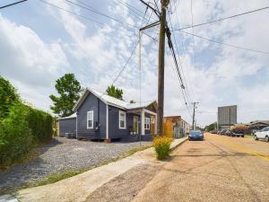 a small house on the side of a street at Buchanan Bungalow - Eclectic Mid-Mod Design DT in Lafayette
