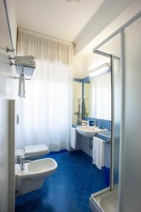 Koupelna v ubytování Hotel Brig