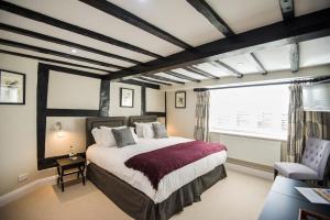 Llit o llits en una habitació de Cowdray Lodge