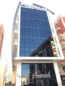 a building with a sign on the front of it at Endglory Hotel in Çorlu