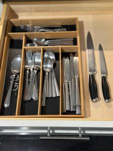 a drawer full of utensils in a box at Studio - NYC, Greenwich, Capitol, Parking in Port Chester