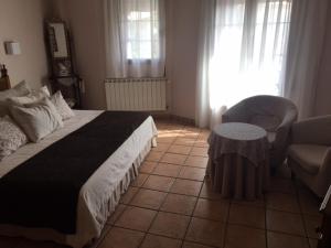Postel nebo postele na pokoji v ubytování Hotel Patri