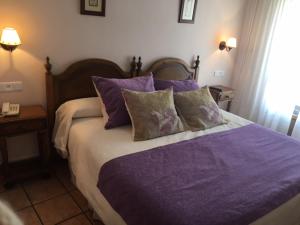 Postel nebo postele na pokoji v ubytování Hotel Patri