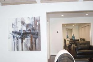 a living room with a couch and a table at Silicon Valley Stays Casa Uno in Mountain View