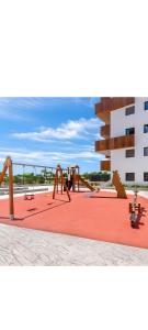 a rendering of a playground with benches and a building at Adhara lll in Torre del Mar
