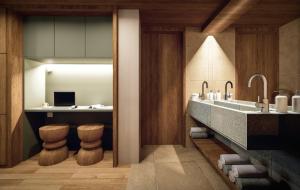 a bathroom with a sink and a counter with stools at Olympus Refuge D in Litochoro