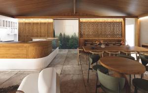 a restaurant with wooden tables and chairs at Olympus Refuge D in Litochoro