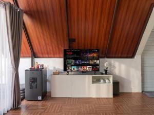 a kitchen with a counter in a room with a ceiling at Himalaya 2 - Private Triangle in Bandung