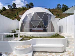 a white domed house with a glass dome at Azalea 1 - Private Dome in Bandung