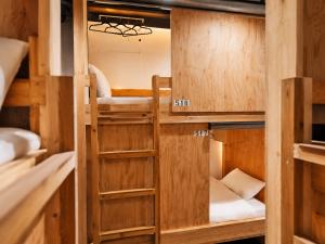 a couple of bunk beds in a room at Tokyo Guesthouse HIVE in Tokyo