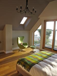 Llit o llits en una habitació de Airds Bay Luxury Beach House