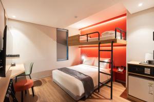a bedroom with a bunk bed and a desk at Best Western Insadong Hotel in Seoul