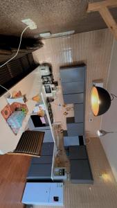 an overhead view of a kitchen with blue counters at شاليه in Al Bukayriyah