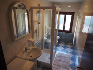 Koupelna v ubytování Casa sul Cielo di Burano + 27 fotografií