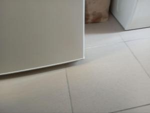 a room with a white tile floor and a door at Lieu inoubliable in Monte Carlo