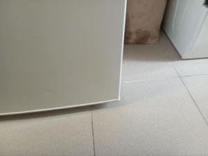 a white door in a room with a tile floor at Lieu inoubliable in Monte Carlo