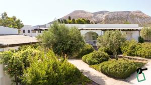 an aerial view of a house with trees and bushes at Hotiday Vulcano Porto in Vulcano
