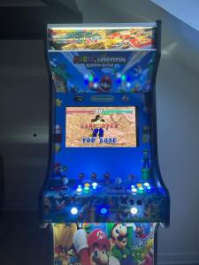 a video game machine with a mario party you root at Super Mario Studio ! in Jaunay-Clan
