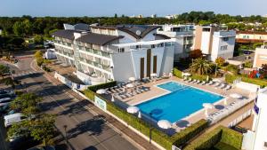 an aerial view of a hotel with a swimming pool at Residenza Turistica Alberghiera Blue Marine in Bibione