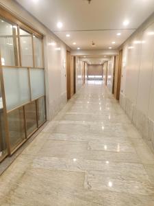 a corridor of a building with at Umbrellaa Hotels in Ahmedabad