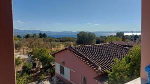 an overhead view of a house with a roof at Pink House Eretria in Eretria