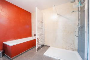a bathroom with a shower stall and a tub at Une parenthèse en Ardenne in Nollevaux +37 photos