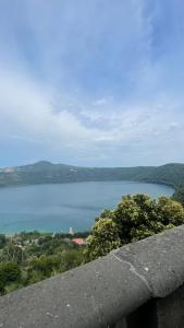 a view of a large body of water at Al numero 15 in Castel Gandolfo +3 photos