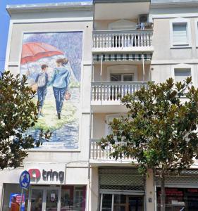 a mural on the side of a building at Bella Vista Apartment in Lezhë