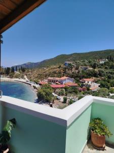 a view from the balcony of a resort at DiPo's Beachside House with Sea View in Samos