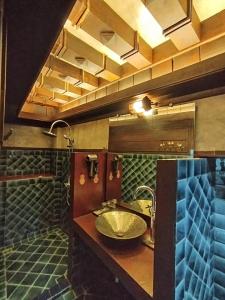 a bathroom with a sink and a mirror at Five Star Guest house in Chiang Mai