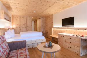 Postel nebo postele na pokoji v ubytování Hotel Montafoner Hof