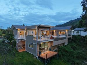 an aerial view of a house with a large deck at Jungle Home in Koh Samui
