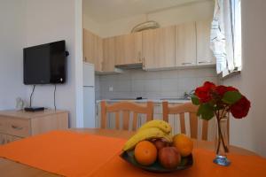 Kuchyň nebo kuchyňský kout v ubytování Apartment Jela