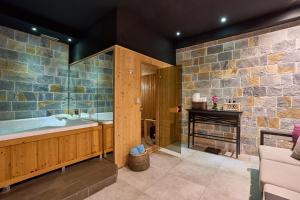 a large bathroom with a tub and a table at Hotel Casa del Mare - Amfora in Kotor +90 photos