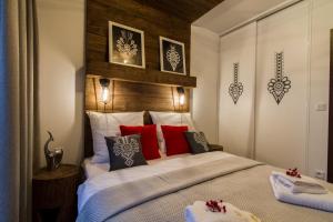 Posteľ alebo postele v izbe v ubytovaní Apartament Hyrny de Lux