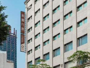 a facade of a building in a city at Guide Hotel Taipei Chongqing in Taipei +98 photos
