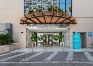 an entrance to a building with a sign in front at BLUESEA Al Andalus in Torremolinos