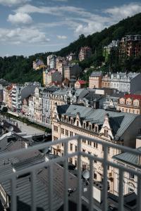 a view of a city with buildings in the background at Castle Hill Residence in Karlovy Vary