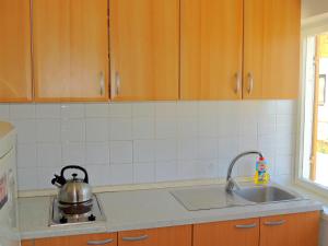 Kuchyň nebo kuchyňský kout v ubytování Apartments Zlatko