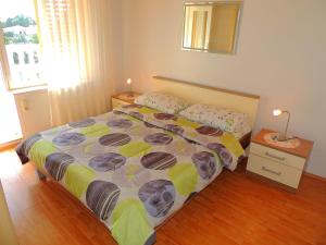 Postel nebo postele na pokoji v ubytování Apartments Zlatko
