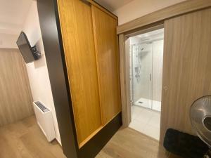 a bathroom with a shower and a glass door at Raianos in Tui +38 photos