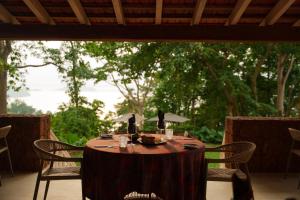 a table with a bowl of food on top at Belo Monte - Principe Collection in Santo António