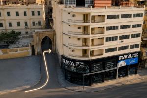 a building with a skate ramp in front of a building at Grand Duplex in Aswan