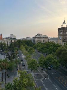 a view of a city with a clock tower at Hostal Delfos in Barcelona